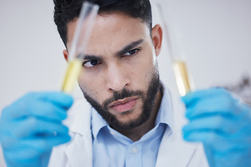Image showing Science, test tube and man thinking of research, vaccine solution and data analysis in laboratory investigation. Healthcare, medical scientist or young person focus for medicine or liquid comparison