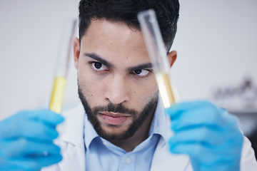 Image showing Test tube, scientist thinking and man in research, vaccine solution or data analysis in laboratory investigation. Healthcare, medical and young science person focus with medicine or liquid comparison