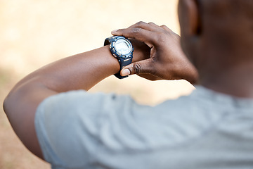 Image showing Man, check smart watch and fitness in park to monitor speed, heart or vital signs. Outdoor, male runner and iot clock for time, training stats or exercise with stopwatch, nature or summer for health