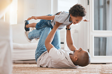 Image showing Kid, father and plane game on floor with smile, bonding and love in living room, family home and care. Man, body child and together for playing, airplane and excited on carpet in lounge with lifting