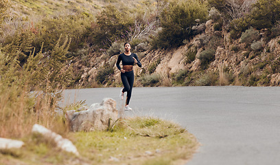 Image showing Fitness, running and road with black woman in nature for health, workout and challenge. Performance, sports and exercise with female runner training on mountain for speed, marathon and wellness