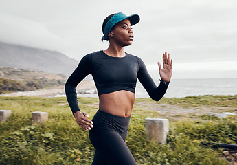 Image showing Fitness, running and cardio with black woman in nature for health, workout and challenge. Performance, sports and exercise with female runner training in outdoor for speed, marathon and wellness