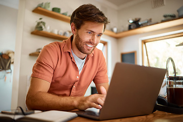 Image showing Networking, laptop and remote work, happy man at kitchen counter with email, social media post or research for job. Technology, writer or freelancer on internet typing blog or online article at home.