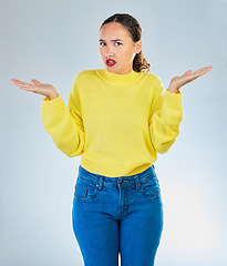 Image showing Portrait, shrug and woman confused, question and decisions against a white studio background. Female person, girl and model with confusion, why and i dont know with emoji, puzzle and choice doubt