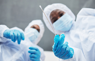 Image showing Science, csi and evidence with people during a medical investigation closeup from below as a team. Collaboration, analysis and forensic with professional samples at a crime scene to collect a sample