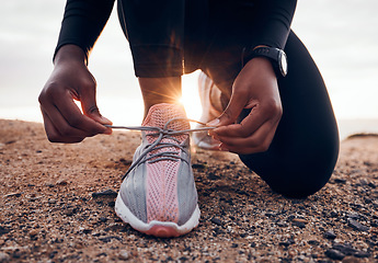 Image showing Shoes, fitness and person typing laces ready for outdoor exercise, workout or hiking for health and wellness. Hands, closeup and athlete or runner prepare for marathon training or endurance running