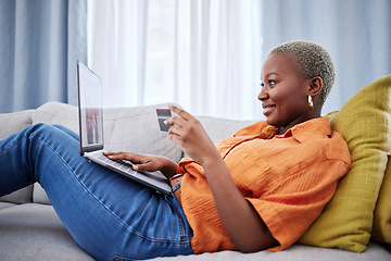 Image showing Credit card, excited or black woman with laptop for payment on ecommerce website for investment. Happy, financial or African girl customer online shopping with money on internet or fintech at home