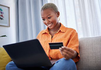 Image showing Laptop, smile or black woman online shopping with credit card for digital product with discount code. Deal, promo or happy girl with financial payment to buy on sale on fintech application at home