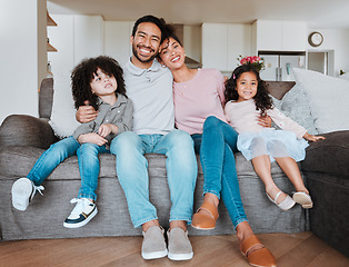 Image showing Portrait of mother, father and kids on sofa together, happy family bonding in living room with love and support. Smile, happiness and parents relax with kids on couch, spending quality time in home.
