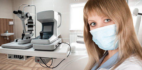 Image showing Female ophthalmologist in protective mask