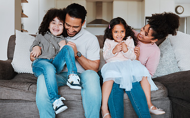 Image showing Mother, father and kids on sofa, playing and happy family bonding together in living room. Smile, happiness and parents relax with young children on couch, playful and spending quality time in Mexico