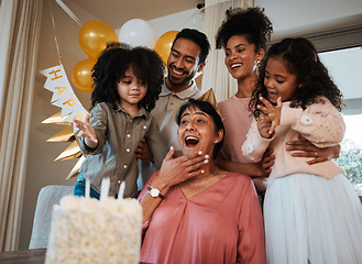 Image showing Birthday, surprise and children with grandmother with cake for event, party celebration and social gathering. Happy family, celebrate and excited grandma with parents and kids for dessert at home