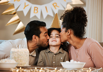 Image showing Father, mother and child at birthday party, kiss and happy with celebration, care and bonding in family house. Dad, mom and young kid with event, excited face and love together at table in apartment