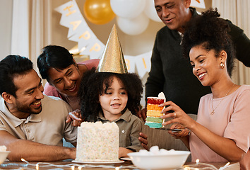 Image showing Father, mother and child with family, birthday cake, and party with celebration, care and bonding in house. Dad, mom and kid with grandparents, excited face and love together at event in apartment