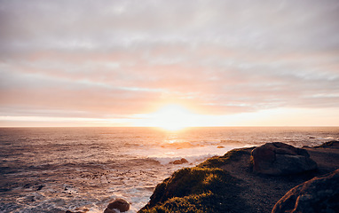 Image showing Background, sunset and sea horizon in environment for peace, nature and tropical island for travel, vacation and mockup space. Empty ocean, clouds and water at beach, sky landscape or evening outdoor