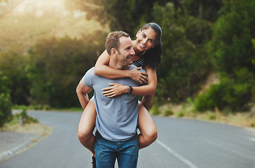 Image showing Piggyback, love or happy couple walking on road or date with smile for romance, summer or adventure. Portrait, trust or man with woman on holiday vacation for bond, support or wellness on street