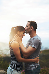 Image showing Forehead, love or happy couple kiss in nature outdoor date with loyalty for romance, care or respect. Mockup space, trust or man with woman together on holiday vacation for bond, support or wellness
