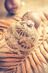 Image showing Beautiful Christmas golden deco baubles with gifts, Happy New Year
