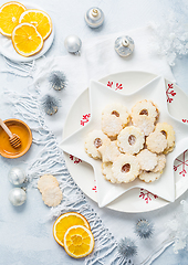 Image showing Homemade Christmas cookies with orange and honey.  Christmas decoration with ornaments.