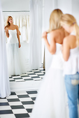 Image showing Wedding, fitting and bride with girl friend in a luxury boutique, shop or store in a mall. Retail, romance and female person from Canada preparing for marriage ceremony, party or reception for love.