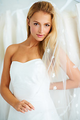 Image showing Wedding, portrait and young bride in a dress in a luxury boutique, shop or store in a mall. Retail, romance and female person from Canada preparing for marriage ceremony, party or reception for love.