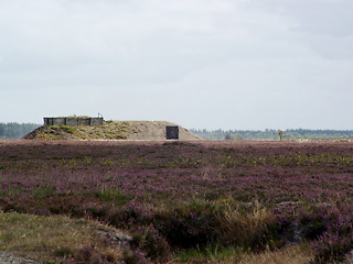 Image showing Army base, training and military target in the countryside with grass, vegetation and a blue sky. War, space and horizon on an empty warzone or battlefield during conflict in a fight for freedom