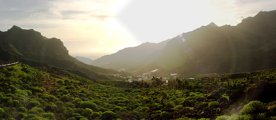 Image showing Landscape, green valley and mountain in nature with forest, field and environment for location and peace. Countryside, land and ecology with trees, growth and woods outdoor for adventure or holiday