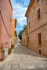 Image showing Typical old town in Mallorca with a narrow street. Alcudia. Balearic Islands Spain.