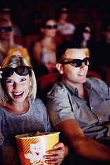 Image showing 3d glasses, happy couple and popcorn, watching movie or eating on romantic date together. Cinema night, man and woman in film theater with snacks, eyewear and smile sitting in auditorium to relax.