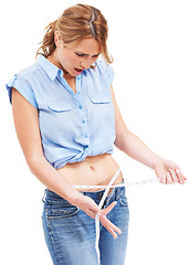 Image showing Health, shock and woman with measuring tape on waist, healthy diet and wellness for body care. Figure, nutrition and flat stomach, girl tracking weight loss progress isolated on white background.