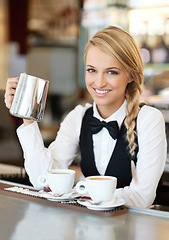 Image showing Coffee, barista and portrait of woman waitress in elegant restaurant, event or dinner. Happy, smile and young female butler from Australia making a latte or cappuccino at luxury party or celebration.