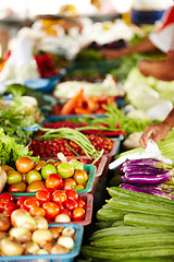 Image showing Vegetables, market and food or hands for shopping with trader goods, sustainable store and vendor. Seller, people or small business table with tomato, onion and green stock for organic marketplace