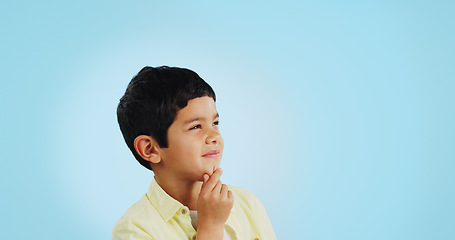 Image showing Thinking, inspiration and ideas, confused youth boy in studio with future or solution on blue background. Why, question with problem solving and remember, mockup space with kid insight and memory or