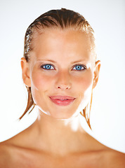 Image showing Shower, cleaning and portrait of woman on a white background for wellness, grooming and cosmetics. Beauty, luxury spa and face of person with wet hair for washing, facial and skincare in studio