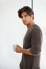 Image showing Coffee, portrait and young man at apartment with positive, confident or good attitude. Handsome, morning and male person from Canada with latte, cappuccino or espresso with pride at modern home.
