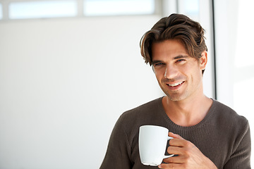 Image showing Portrait, smile and man with coffee in home for breakfast, warm beverage or relax in morning with mockup space. Happy guy enjoy drinking mug of fresh caffeine, cappuccino or hot espresso in apartment