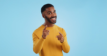 Image showing Face, excited and black man pointing at you for decision, choice or selection in studio isolated on a blue background mockup space. Portrait, hand gesture and person hiring, recruitment or invitation