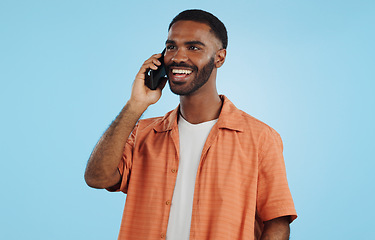Image showing Phone call, funny and black man talking, conversation and joke in studio isolated on a blue background mockup space. Smartphone, laughing and happy African person in communication, meme and comedy