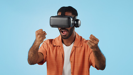 Image showing Gamer man, virtual reality and glasses in studio with hand, click and swipe in metaverse by blue background. Person, AR vision and futuristic 3D user experience with grab, cyber ui and digital world