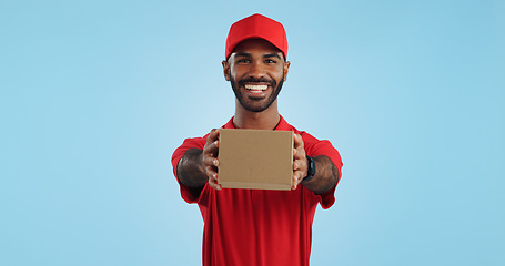 Image showing Black man in portrait with delivery, box and ecommerce, distribution with supplier and service on blue background. Giving package, supply chain and logistics worker for shipping and courier in studio