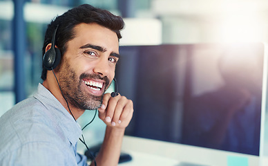 Image showing Portrait, telemarketing and man with a computer, call center and lens flare with headphones, crm and tech support. Face, office or agent with a headset, customer service and help desk with consultant