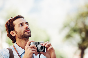 Image showing Photographer, camera or man on holiday, vacation or trip for a fun summer adventure in Italy looking up. Bokeh mockup space, tourist or person with sightseeing in nature journey or park for travel