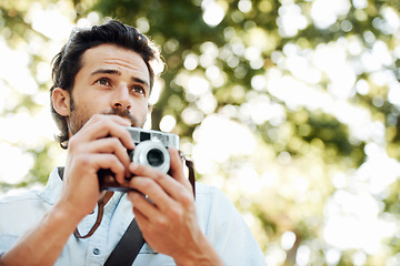 Image showing Camera, photographer or man in nature on holiday vacation trip for creativity, shooting or tourism memory. Photography, travel or male tourist with pictures for sightseeing or trees in park in summer