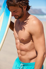 Image showing Beach, fitness and man at a beach with surfboard for training, cardio or water sports. Surfing, freedom and male surfer at the sea for summer, fun and adventure, travel or holiday, workout or hobby