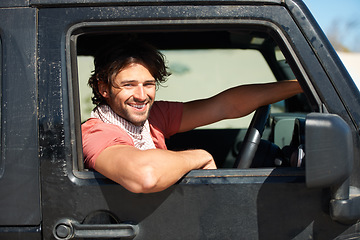 Image showing Smile, portrait and man in van on road trip with freedom, travel and desert adventure for summer vacation. Transport, holiday journey and happy driver in car with nature, sunshine and countryside.