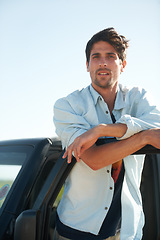 Image showing Freedom, portrait and man in car on road trip at door, travel and desert adventure for summer vacation. Transport, holiday journey and calm person standing at van in nature, sunshine and countryside.