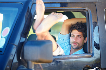 Image showing Road trip, man or feet on window of transport for relax, peace and adventure with travel or destination. Person, tourist or traveler with chilling on vacation, holiday or traveling journey in nature