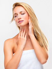 Image showing Shower, beauty and skin of a fresh woman in studio on a white background for natural wellness or cosmetics. Skincare, cleaning and towel with a confident young model at the salon for dermatology