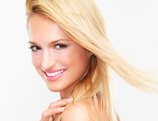 Image showing Happy woman, portrait and face in skincare, makeup or beauty cosmetics against a studio background. Closeup of female person, blonde or model smile in relax for spa, hair salon or facial treatment