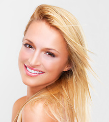 Image showing Happy woman, portrait and face in skincare beauty, makeup or cosmetics against a studio background. Female person, blonde or model smile for spa salon or facial treatment in relax or skin dermatology